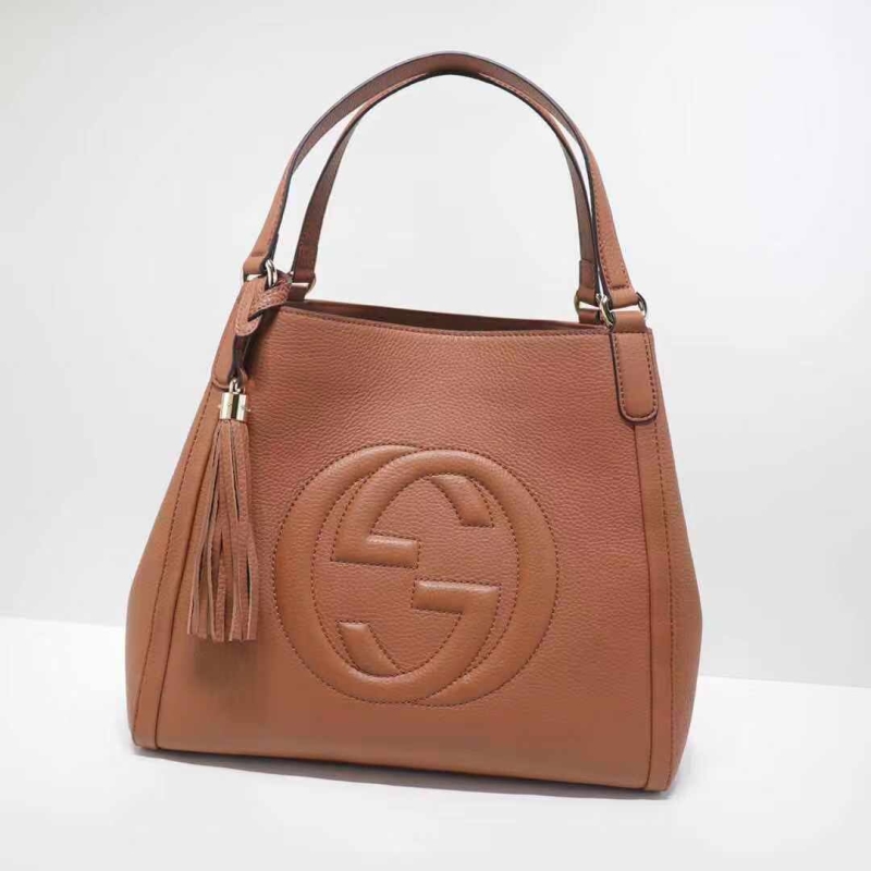 G*u*i top handle bags
